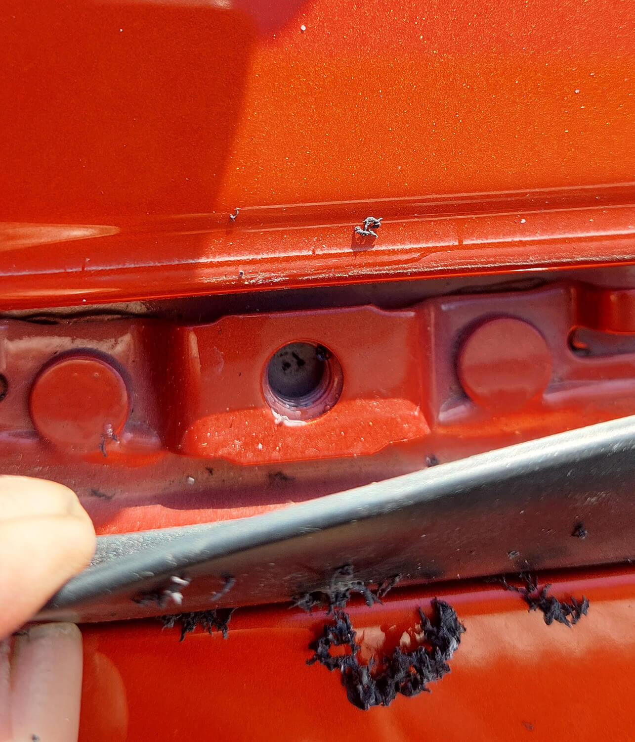 M8 reserv bolt hole under gutter rubber